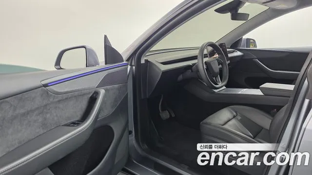 Tesla Model Y — Фото автомобиля 15