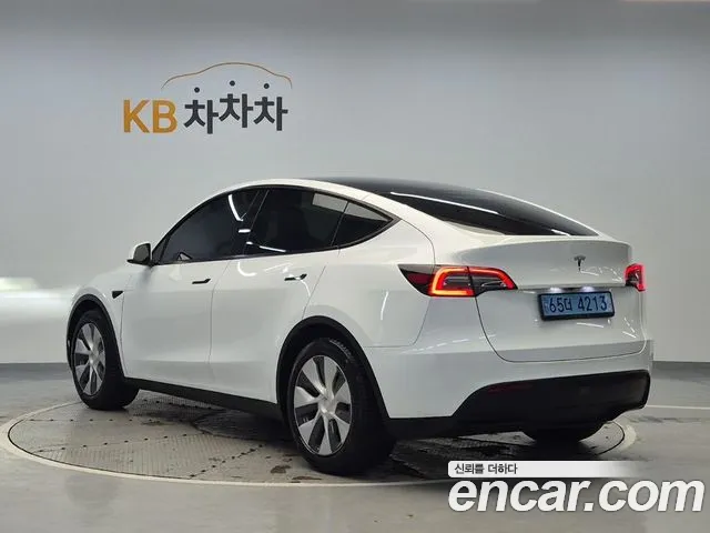 Tesla Model Y — Фото автомобиля 2
