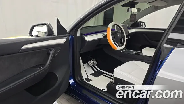 Tesla Model Y — Фото автомобиля 15