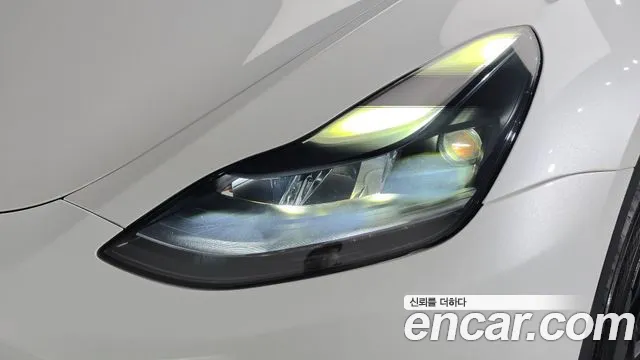 Tesla Model Y — Фото автомобиля 7