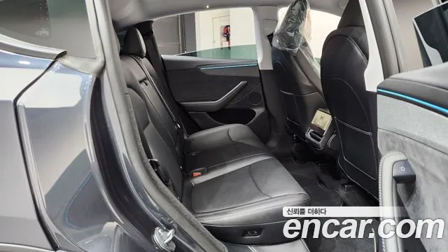 Tesla Model Y — Фото автомобиля 10