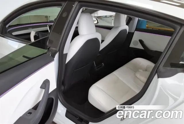 Tesla Model 3 — Фото автомобиля 7