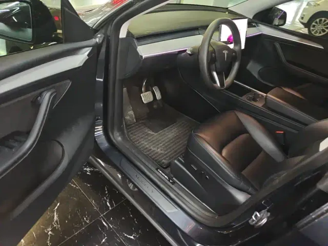 Tesla Model Y — Фото автомобиля 15