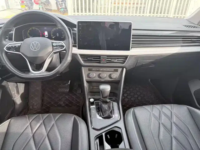 Volkswagen Tiguan L — Фото автомобиля 5