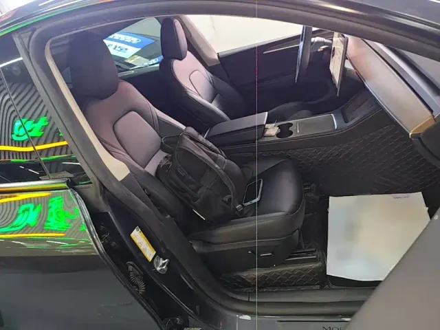 Tesla Model Y — Фото автомобиля 24