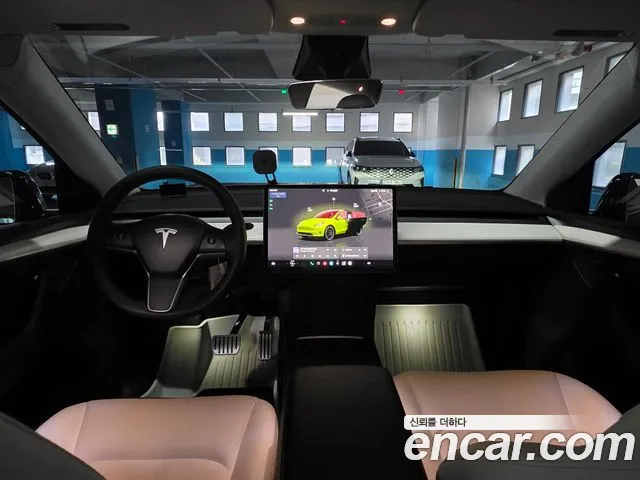Tesla Model Y — Фото автомобиля 16
