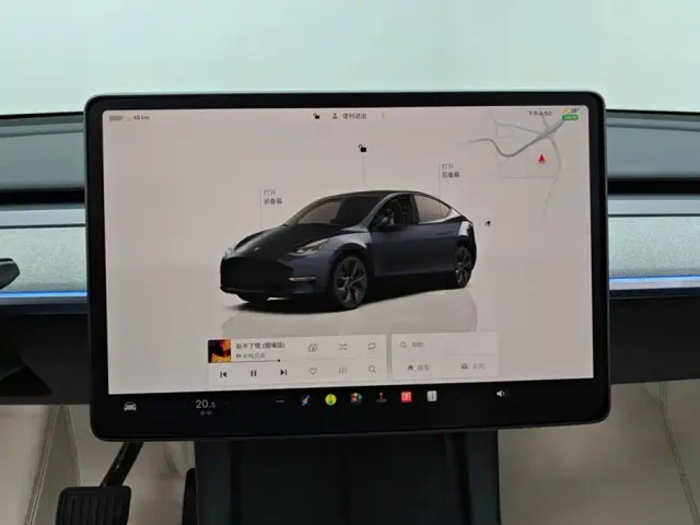 Tesla Model Y — Фото автомобиля 14