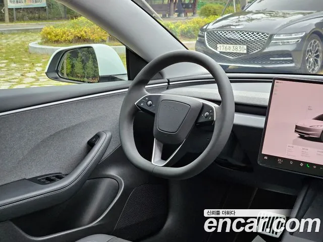 Tesla Model 3 — Фото автомобиля 6