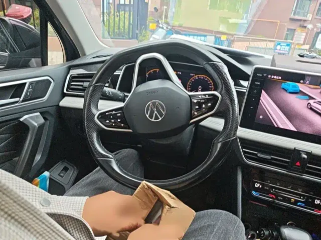 Volkswagen Tiguan L — Фото автомобиля 2