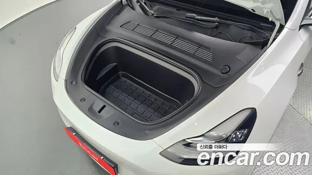 Tesla Model Y — Фото автомобиля 6