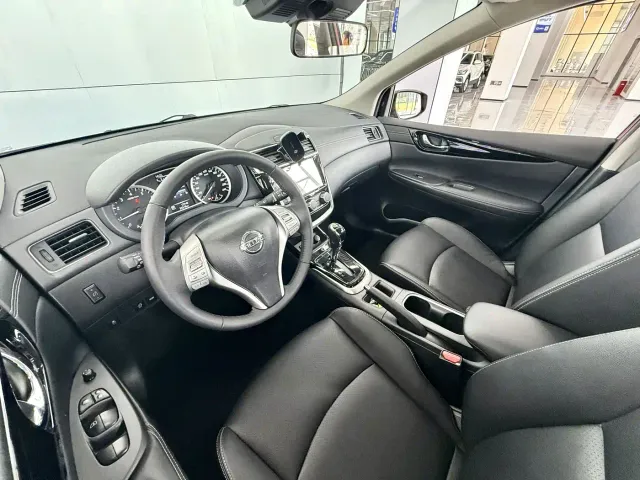 Nissan Tiida — Фото автомобиля 6