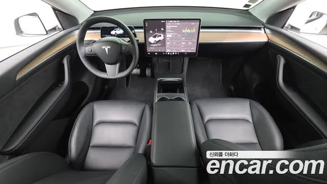 Tesla Model Y — Фото автомобиля 10