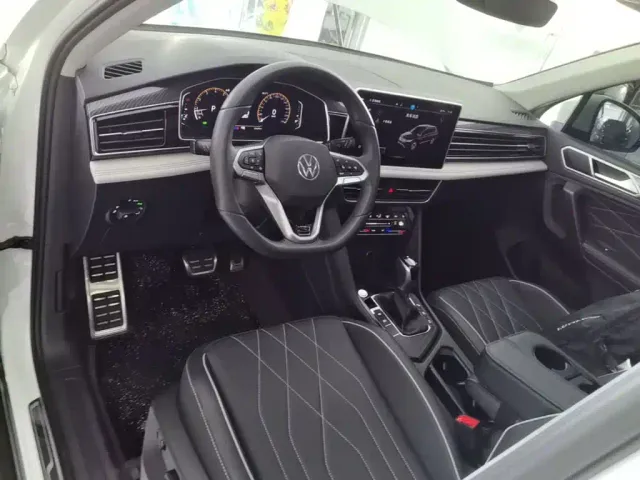 Volkswagen Tiguan L — Фото автомобиля 9
