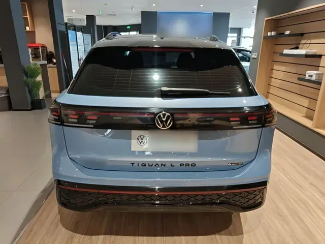 Volkswagen Tiguan L — Фото автомобиля 5