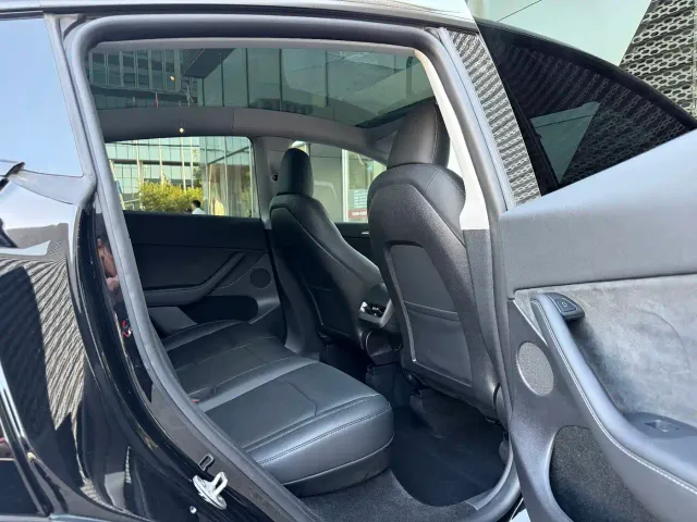 Tesla Model Y — Фото автомобиля 7