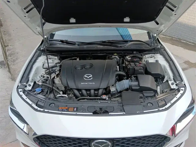 Mazda Axela — Фото автомобиля 15
