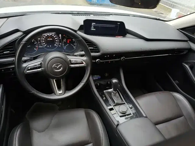 Mazda Axela — Фото автомобиля 9