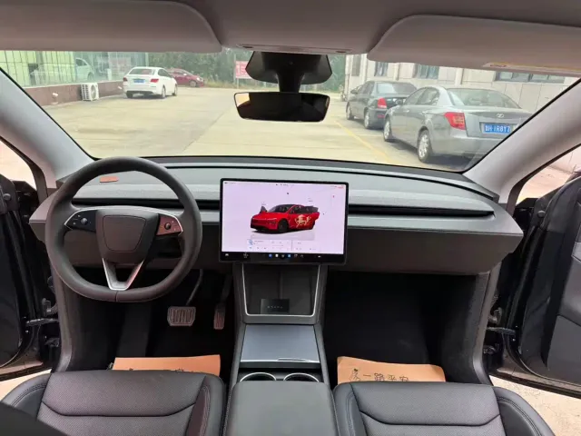 Tesla Model Y — Фото автомобиля 9
