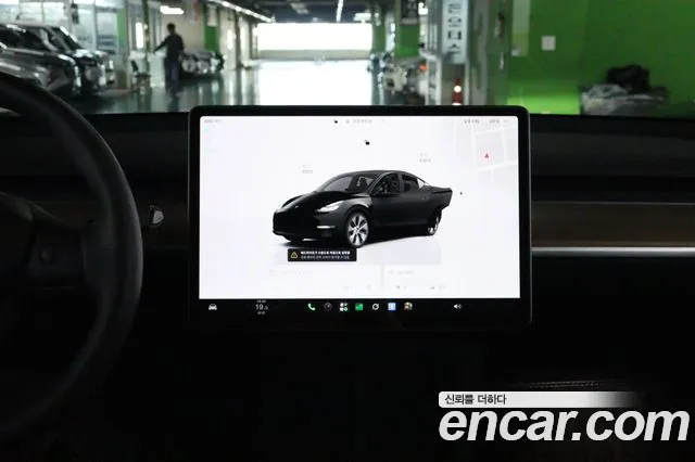 Tesla Model Y — Фото автомобиля 12