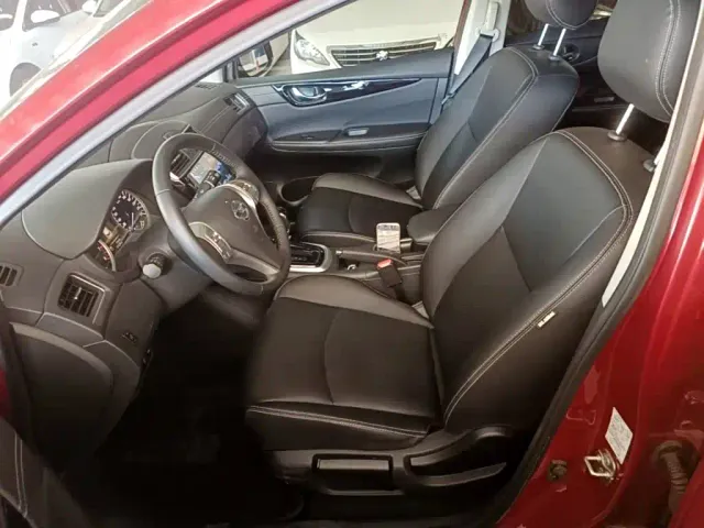 Nissan Tiida — Фото автомобиля 14