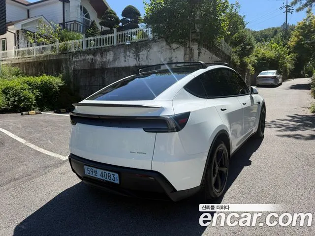 Tesla Model Y — Фото автомобиля 2