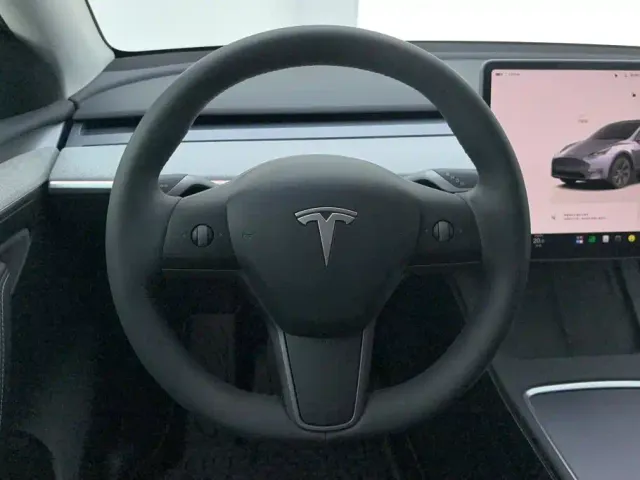 Tesla Model Y — Фото автомобиля 15