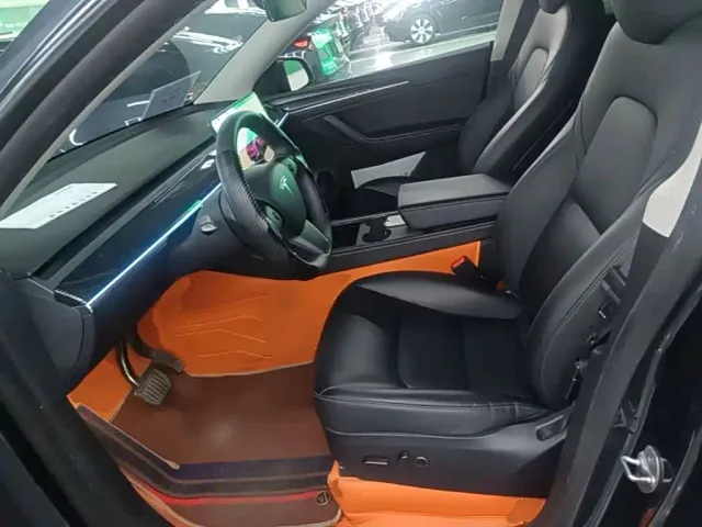 Tesla Model Y — Фото автомобиля 14