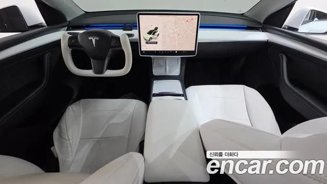 Tesla Model Y — Фото автомобиля 7