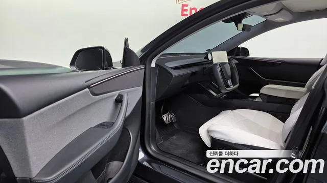 Tesla Model Y — Фото автомобиля 14