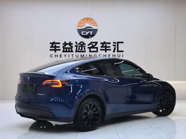 Tesla Model Y — Фото автомобиля 5