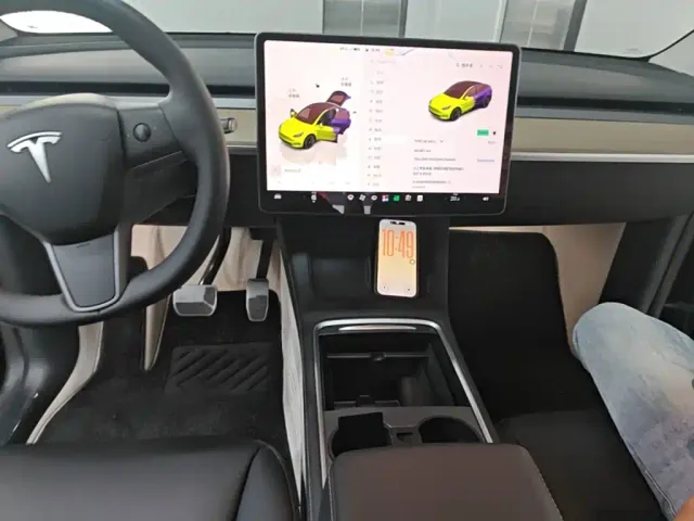 Tesla Model Y — Фото автомобиля 11