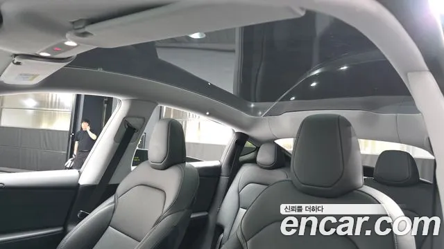 Tesla Model Y — Фото автомобиля 16