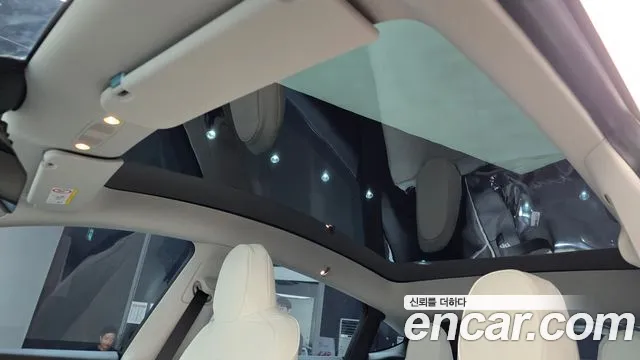 Tesla Model Y — Фото автомобиля 15