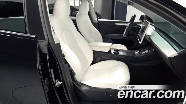Tesla Model Y — Фото автомобиля 16