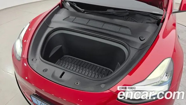 Tesla Model Y — Фото автомобиля 6