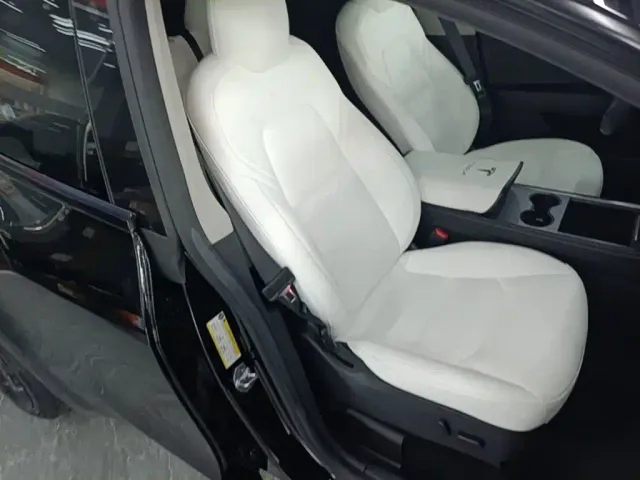 Tesla Model Y — Фото автомобиля 24