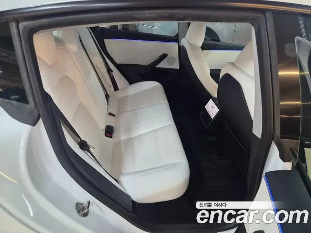 Tesla Model 3 — Фото автомобиля 19