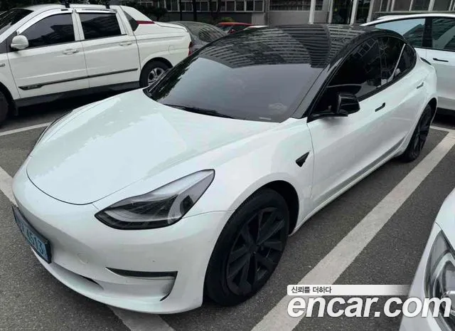 Tesla Model 3 — Фото автомобиля 3