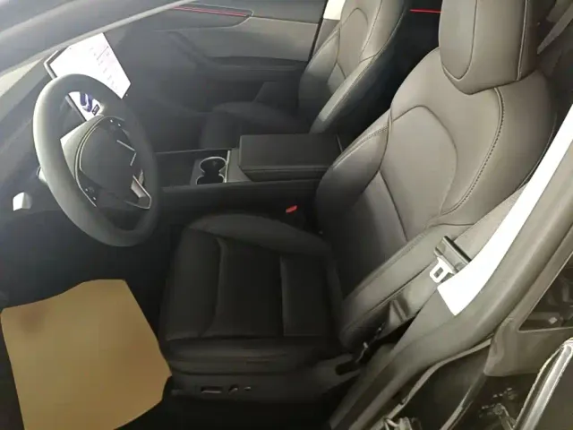 Tesla Model Y — Фото автомобиля 14