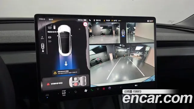 Tesla Model 3 — Фото автомобиля 15