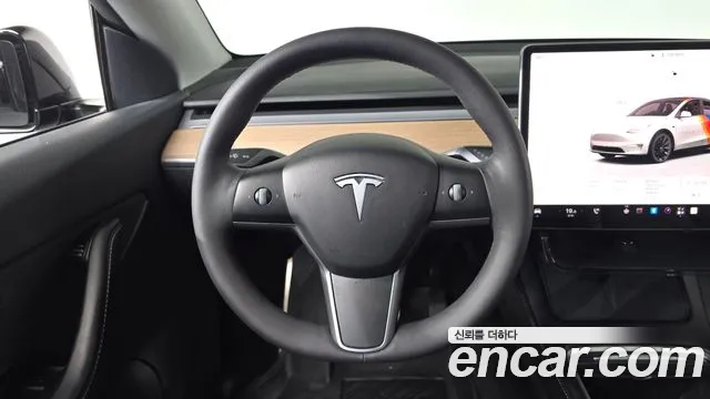 Tesla Model Y — Фото автомобиля 13
