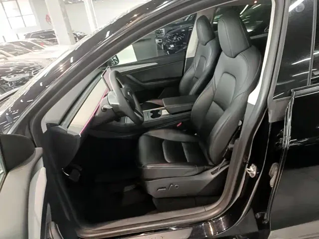 Tesla Model Y — Фото автомобиля 14