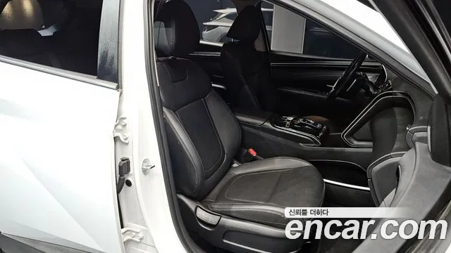 Hyundai Tucson Tucson (NX4) Бензин 1.6 Turbo 4WD — Фото автомобиля 10