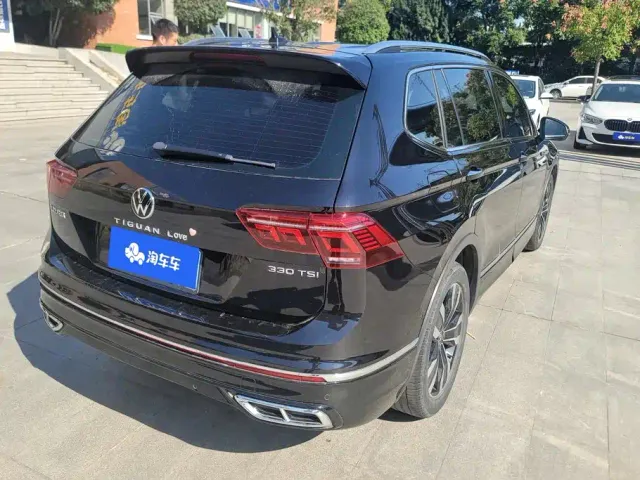 Volkswagen Tiguan L — Фото автомобиля 3