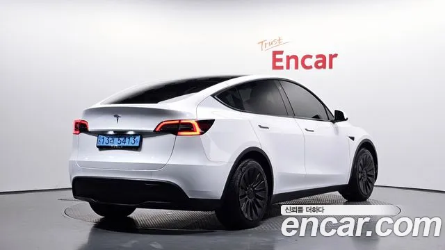 Tesla Model Y — Фото автомобиля 2