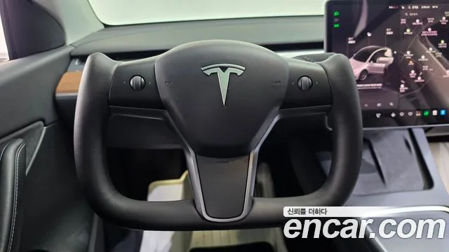Tesla Model Y — Фото автомобиля 13