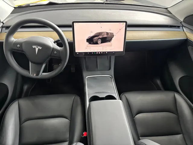 Tesla Model Y — Фото автомобиля 9