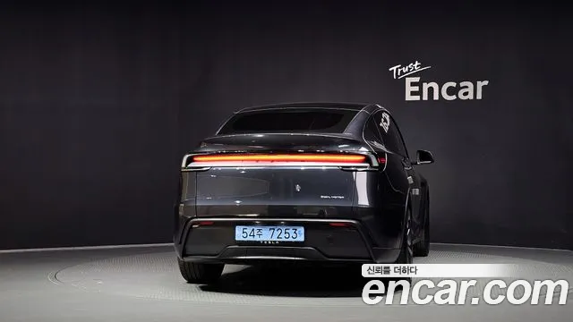 Tesla Model Y — Фото автомобиля 4