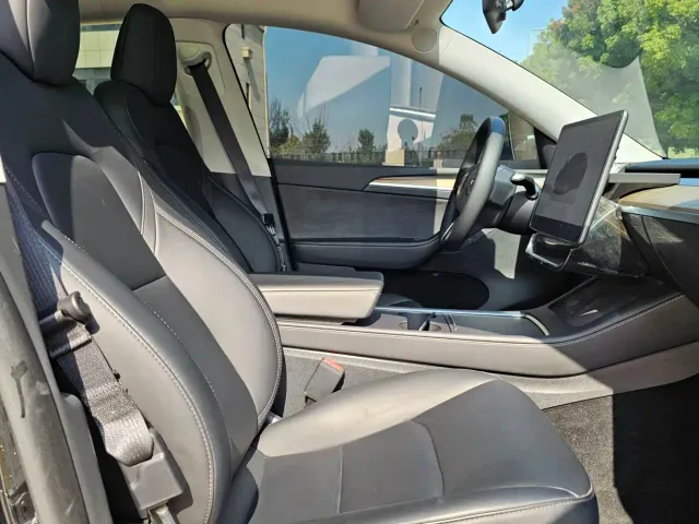 Tesla Model Y — Фото автомобиля 14