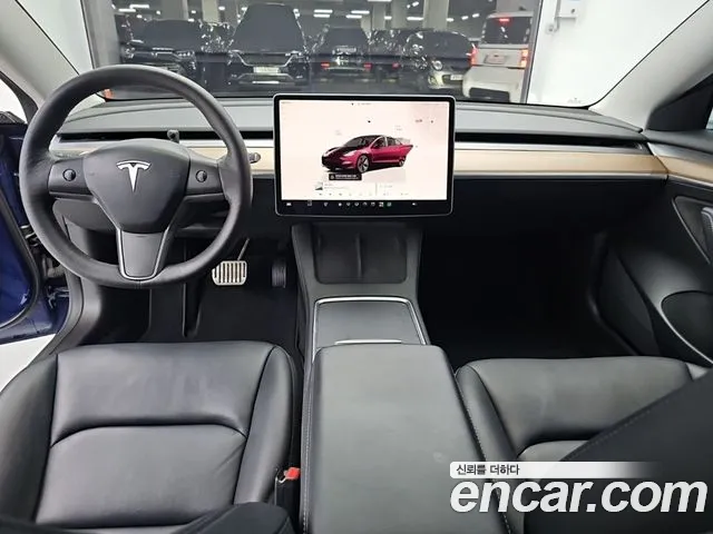 Tesla Model 3 — Фото автомобиля 7
